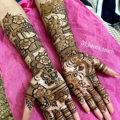 This full-hand design is a great example of our fusion work. It blends geometric grids with bold floral patterns, creating a rich and textured look that covers the hands beautifully.