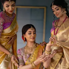 A beautiful moment between models during a traditional jewelry and saree photoshoot. I focus on creating a narrative, capturing interactions that feel genuine and elegant.