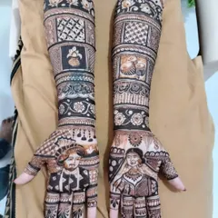 A beautiful example of my portrait work. The palms feature clear and detailed figures of the bride and groom, surrounded by traditional patterns and wedding symbols.