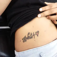 Before: This client wanted to cover a name and heartbeat tattoo on their side.