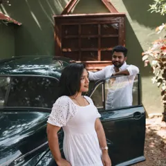 Another angle featuring the vintage car, this time with a focus on the couple's interaction. This shows how you can use the props to create different compositions and tell a story.