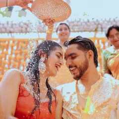 The pure delight on the couple's faces during their Haldi ceremony. Capturing this level of unrestrained joy is what makes being a wedding storyteller so rewarding.