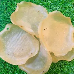 These are my homemade Rice Papads, also known as Khichiya. They are light, crispy, and ready to fry for a perfect meal accompaniment or a standalone snack. The jeera seeds add a lovely aromatic flavor.