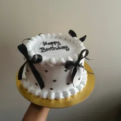Another view of the black and white vintage ribbon cake, a very popular Pinterest-inspired design.
