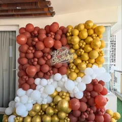 Another angle of the multi-colored balloon wall, showcasing its density and how it serves as a fantastic photo background for any celebration.