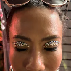 We love to bedazzle! This custom rhinestone eye makeup is perfect for music festivals, sangeet nights, or any event where you want to shine. All our face jewels are skin-safe and applied to last through the night.