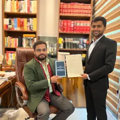 Recognizing one of our January law interns for their hard work and dedication. I gift a copy of the Constitution of India to interns to remind them of the foundation of our legal system.