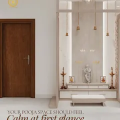 Your pooja space should be a sanctuary of peace. Here, I've created a modern prayer nook using a palette of serene whites and warm neutrals, accented by soft backlighting and traditional brass bells. This Vastu-aligned design provides a calm, divine corner that feels both sacred and sophisticated.