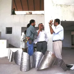 On-site discussions with artists and craftspeople are a critical part of our design process. This image captures a working session for the LMW Headquarters, where sculptural elements for the building were being reviewed and refined.