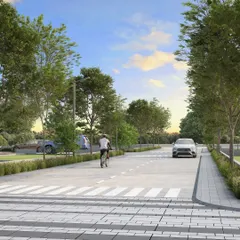 This render for the Tricone City extension in Indore illustrates our streetscape design, featuring dedicated cycling lanes, pedestrian walkways, and green buffers to create safe and pleasant mobility corridors.