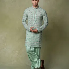 A classic full-length e-commerce shot for menswear. The simple pose and neutral background provide a clear and professional view of the kurta set, perfect for online catalogs.