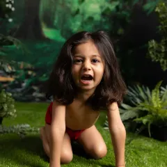 A mighty roar from our little Mowgli! I love encouraging kids to get into character and have fun during our themed sessions.