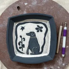 A custom plate immortalizing a beloved pet. These personal commissions are a joy to work on, turning memories and love into lasting ceramic art.