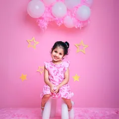 In a Barbie world! This all-pink setup with stars and a fluffy rug is perfect for any child who wants to live out their Barbie dream.