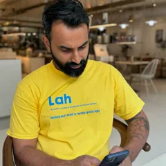 My husband Vinesh, looking very much the part in his "Lah" t-shirt. It's a fun nod to the Malaysian slang that inspired our restaurant's name.
