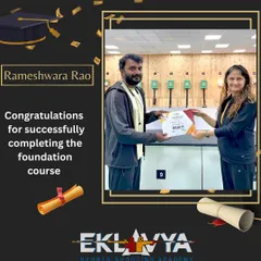 Another proud graduate, Rameshwara Rao, receives his certificate from one of our head coaches. We are committed to recognizing the hard work and progress of every student in our academy.