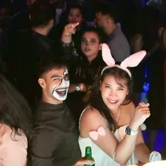 Guests in bunny ears and spooky face paint for our Halloween party. I encourage everyone to get creative and embrace the theme.
