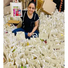 This is me, the *marzi ki malkin* behind Winsome Hampers, surrounded by a successfully executed bulk order. I personally manage every project to ensure quality, whether it's for a small team or a large corporation needing hundreds of gifts delivered across India.