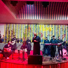 A full stage view of a performance with my band, Saaz-e-Mehfil. We bring a complete musical experience with multiple vocalists and instrumentalists for a rich sound.