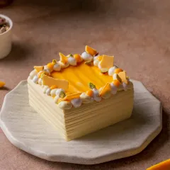 This is my Mango No Added Sugar Bento Cake. It's not only gluten-free but is sweetened naturally with real Alphonso mangoes, so you get a truly clean, fruity flavour in every bite. It's a perfect guilt-free treat for one or two people.