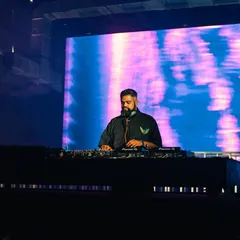 Opening for the legendary Stephan Bodzin at DGTL Festival was a career highlight. Here I am at the console on the Modular Stage, focused on building a sonic journey to prepare the crowd for the main act.
