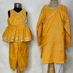 A closer look at the beautiful fabric and design of our yellow brocade sibling set, perfect for a Haldi ceremony or festive puja.