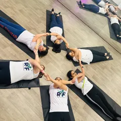 A beautiful star formation created by our members holding hands and feet. This group pose from our International Yoga Day celebration is a perfect example of the unity and connection we foster.