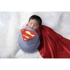 Your little one is already a superhero in your eyes, and we can create a fun photoshoot to match. This custom Superman theme shows how we can play with creative ideas to capture your baby's budding personality in a unique and memorable way.