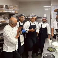 Chef Shantanu Mehrotra briefs the kitchen team, ensuring every member understands the vision and execution for the service ahead. Teamwork is the key to our consistency.