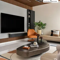 I believe a living room should be a seamless blend of style and comfort. This space features a modern media wall with integrated storage, a comfortable sectional sofa, and a mix of textures that create a warm, inviting atmosphere for relaxation and entertainment.