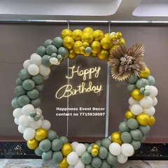 I can use different color palettes and materials to match your theme. This balloon ring features a modern mix of sage green, white, and gold balloons, accented with dried pampas grass for a rustic touch.