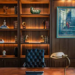 Designing an office is about creating a space that is both productive and inspiring. For this workspace at One Place Lodha, I focused on a sophisticated, warm atmosphere using rich wood tones, classic English-style decor, and carefully selected furniture. The goal was to make it feel less like a corporate office and more like a refined, comfortable study.
