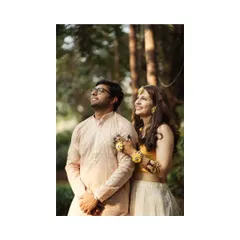 A beautiful portrait of Amanda and Ankur during their mehendi ceremony. The soft natural light and their coordinated outfits create a serene and joyful image.