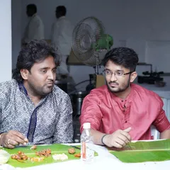 Good food sparks great conversations. Here, guests connect over a delicious banana leaf meal, making memories while enjoying the authentic taste of Karnataka cuisine.