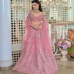 For a Sangeet or cocktail night, a beautifully draped lehenga makes all the difference. I styled this dreamy pink lehenga to ensure it was comfortable enough for dancing while looking absolutely breathtaking from every angle.