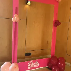 An interactive, life-sized Barbie photo frame. This prop is a fantastic addition to a themed party, providing a fun activity and creating memorable photos for the guests.