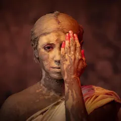 The first step: clay on a straw frame. This image represents the initial, raw stage of creation, drawing a parallel to the story of Maa Durga's own creation by the Gods to be a figure of strength.
