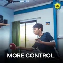 A young player shows excellent control and focus during a match. We teach players of all ages how to command the table with precise shots and smart play.