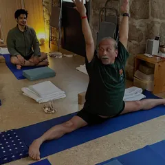 The full expression of Hanumanasana, or the splits. This pose is the culmination of dedicated practice in opening the hips and hamstrings.