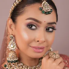 Creating expressive bridal eyes is a key focus. Here, you can see the detailed eyeshadow work and liner application that defines and enhances the eyes, a skill you'll perfect with hands-on practice.
