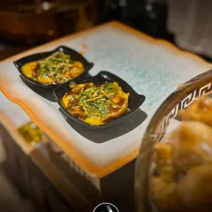 My Samosa Ragada Chaat is pure comfort food. I serve it in individual portions, with a crushed samosa topped with hot ragada, tangy chutneys, and a sprinkle of sev for that perfect crunch.