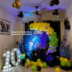 A full view of the Harry Potter themed birthday setup in a home living room. The decor fills the space with magical elements, perfect for any fan.