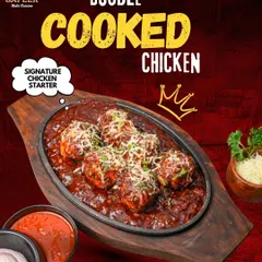 This is our signature Double Cooked Chicken, a starter that's crispy on the outside and tender on the inside. It's served sizzling in a rich, tangy sauce and topped with cheese, making it a favourite for many of our guests.