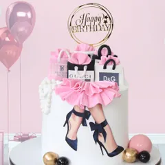 Another angle of my popular fashion diva cake, showcasing the detailed fondant work. The ruffled pink skirt, pearl necklace, and designer shopping bags are all completely edible and made by hand.