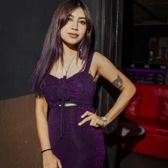 A photo from my gig in Bahrain. I loved this purple dress, it perfectly matched the club's lighting and vibe.
