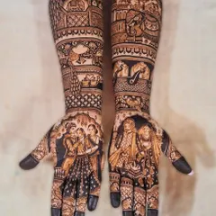 This narrative bridal mehndi captures multiple wedding scenes, from the varmala ceremony to the doli, telling a complete story across both arms with incredible detail.