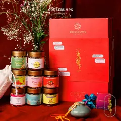 A full view of the massive Raksha Bandhan gift box, overflowing with treats like Rose Badam Mukhwas, Masala Cranberry, and Pani Puri Cashews. It’s a gift that truly captures the sweet and savoury nature of sibling bonds.