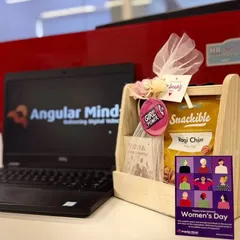 A Women's Day gift basket for the employees at Angular Minds, placed on an office desk. It was an honor to be chosen as a woman-owned business for this celebration.