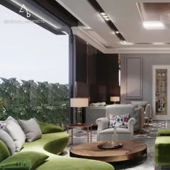 In this Rajokri farmhouse living room, I used a vibrant green curved sofa as a centerpiece, set against a backdrop of floor to ceiling windows. The design emphasizes natural light and an open, airy feel, connecting the elegant interiors with the lush greenery outside.