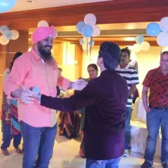 Getting guests on their feet for some interactive fun. A good party host knows how to get people involved, and I love bringing guests on stage for games and activities.
